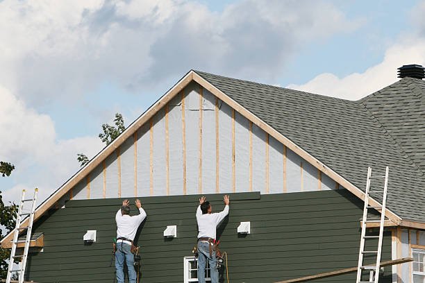 Professional Siding technician working in Wade, NC